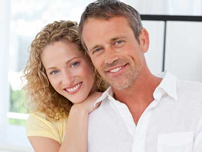 Cosmetic medicing - happy couple smiling after treatment