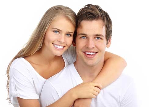Young couple happy about their facial treatments